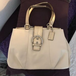 Coach bag - off white with gold trim/accents.